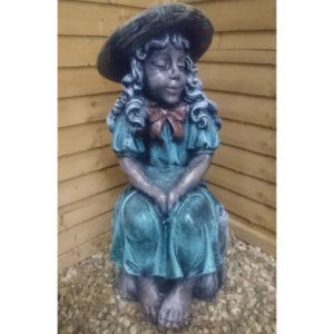 Girl Sitting on a Rock