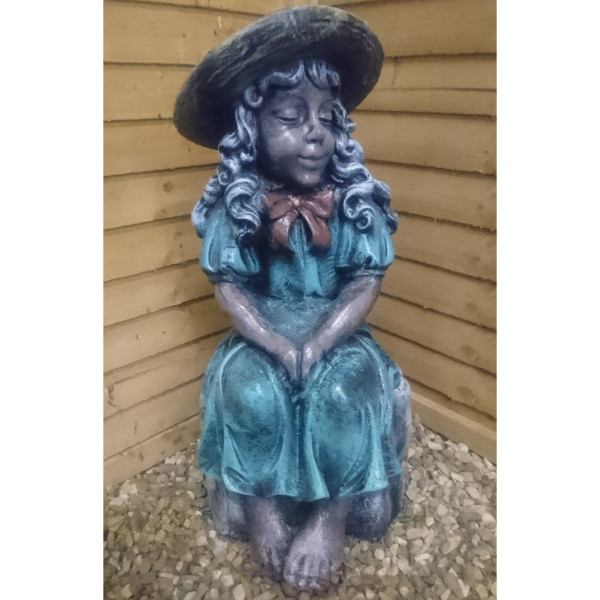 Girl Sitting on a Rock